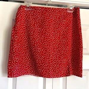 Orangish Pink Fabric with White Leaf Pattern